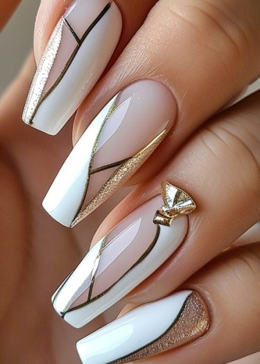 Elegant geometric nail art featuring coffin-shaped nails with pink base, white design, and gold accents.