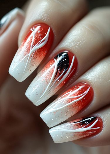 Stunning gradient red and white nail art with intricate designs and subtle glitter accents.