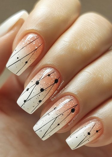 Elegant peach-pink gradient nails with geometric black line art and glitter accents.