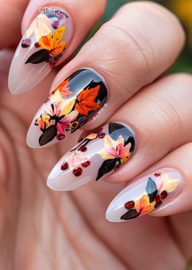 Exquisite autumn-themed nail art featuring vibrant leaves and berries on almond-shaped nails.