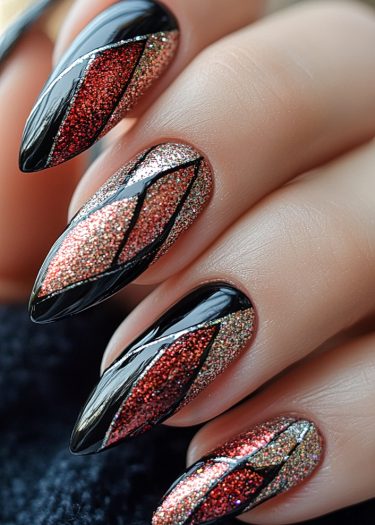 Elegant stiletto nails with red and gold geometric patterns and black glitter accents.