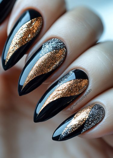 Elegant black almond-shaped nails with gold and silver glitter accents create a stunning design.