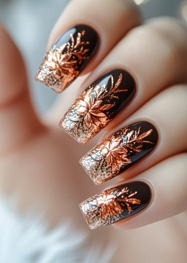 Stunning black, rose gold, and silver floral nail art design with glossy finish.