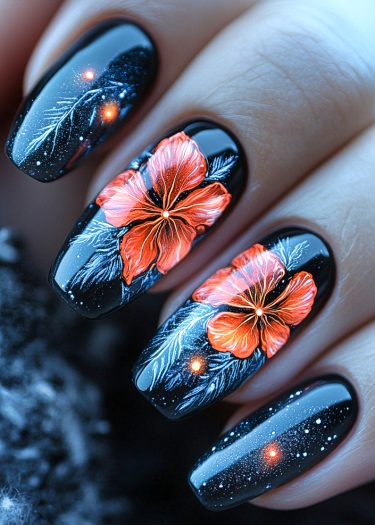 Elegant black nails with vibrant orange-red hibiscus flowers and intricate white cosmic patterns.