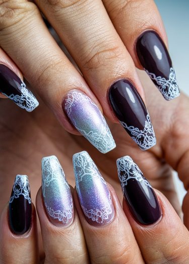 Elegant burgundy nails with lace designs and iridescent accents for stunning nail art inspiration.