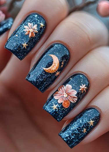 Cosmic floral nail art featuring blue starry background with gold and copper crescent moon design.