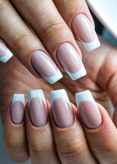 Elegant French manicure with perfectly shaped square nails and glossy finish.