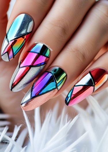 Stunning colorful geometric nail art with metallic accents and sleek almond shape.