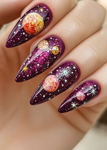 Cosmic plum nail art featuring stiletto shapes, vibrant planets, and shimmering stars.