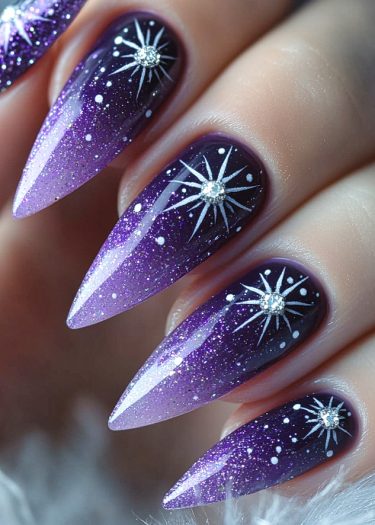 Cosmic stiletto nails with purple gradient and star designs for an elegant, celestial look.