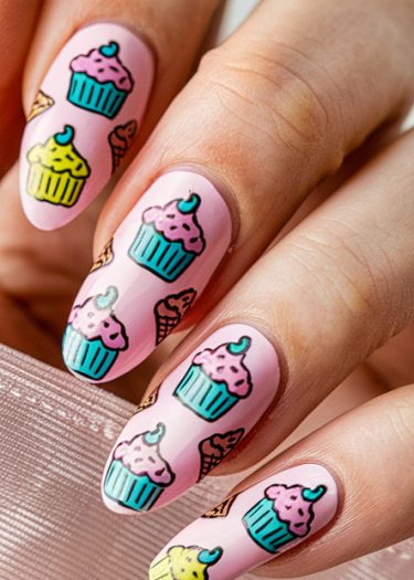 Cute cupcake and ice cream nail art with pastel pink polish for a delightful look.