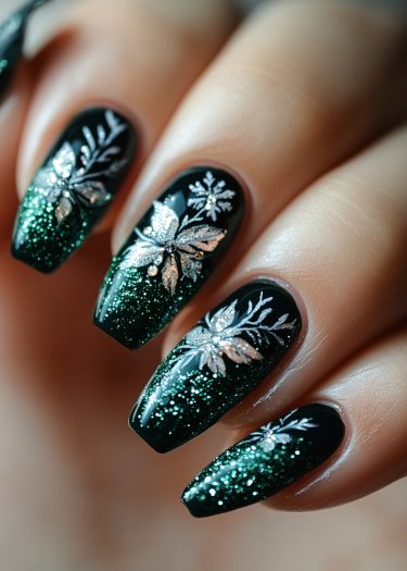 Elegant dark green and silver glitter nail art with intricate leaf designs.