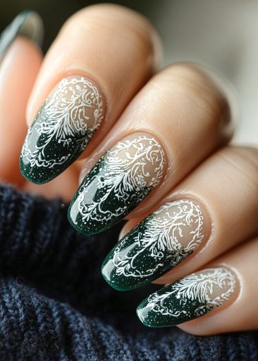 Intricate dark green gradient nail art with white botanical design on almond-shaped nails.