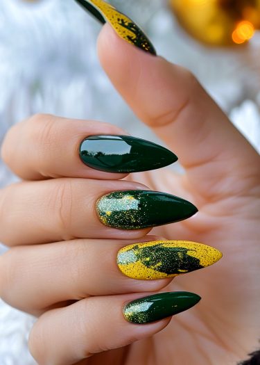 Elegant almond-shaped nails in dark green and vibrant yellow with glittery design.