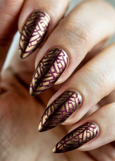 Elegant almond-shaped nails in metallic gold with intricate purple geometric patterns.