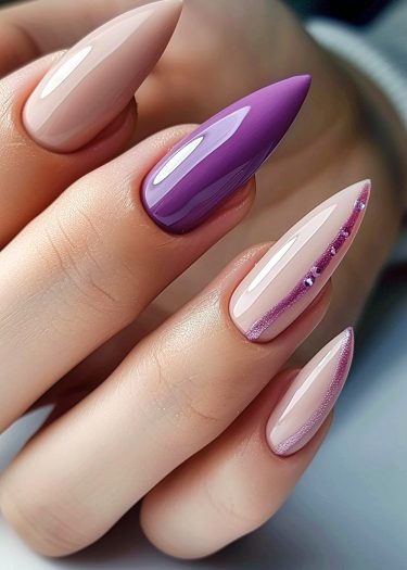 Elegant almond-shaped nails with vibrant colors and glamorous designs showcasing exquisite nail art.