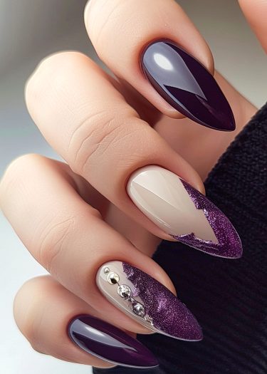 Elegant almond-shaped nails in deep purple and creamy white with shimmering violet glitter.