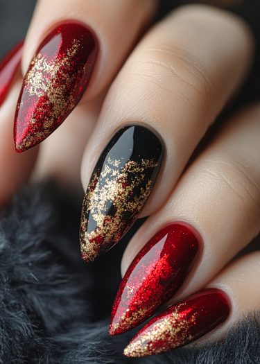 Luxurious almond-shaped nails with red and black design, featuring stunning gold flakes.