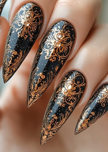 Stunning black and gold stiletto nail art featuring intricate designs and sparkling gems.