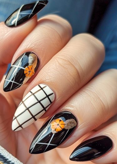 Stiletto nails feature elegant black, white, and gold designs with intricate patterns and floral accents.