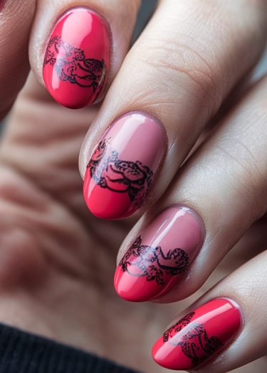 Elegant almond nails with red and pink gradient and intricate black floral designs.