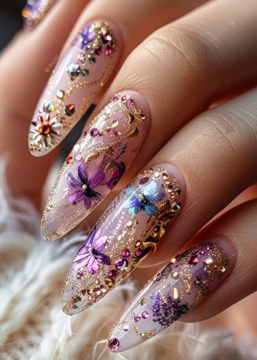 Exquisite long almond-shaped nails featuring elegant floral designs, vibrant colors, and glamorous rhinestones.