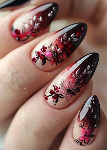 Elegant floral nail art with burgundy ombré and rhinestone accents for a sophisticated look.