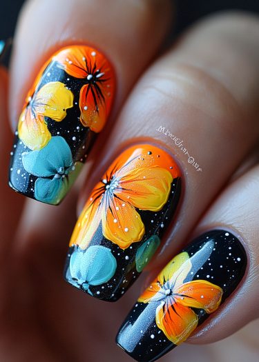 Stunning floral nail art on black base with vibrant colors and intricate detailing.