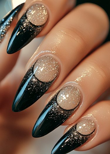 Elegant almond-shaped nails with black tips and glittery nude gradient for a stunning manicure.