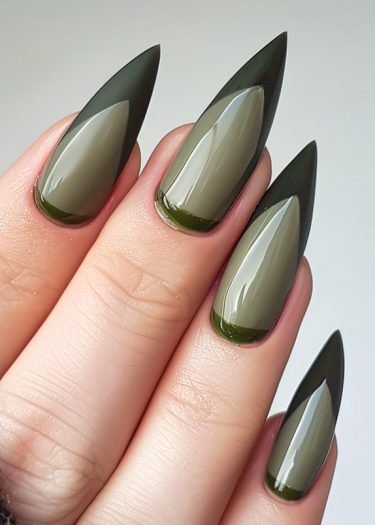 Stylish stiletto nails in olive and forest green with a glossy gradient finish.