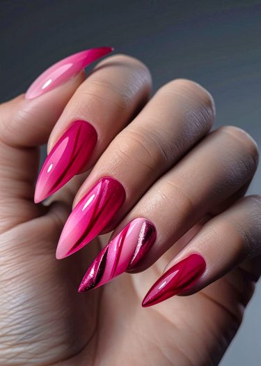 Sophisticated pink stiletto nail art with shimmering gradients and intricate designs.