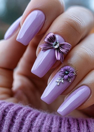 Elegant lavender almond nails with 3D bow and flower art enhance a stylish, cozy look.