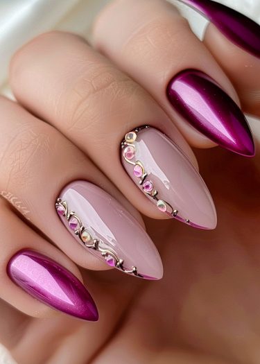 Elegant magenta and pastel pink almond-shaped nails with dazzling gems and pearls.