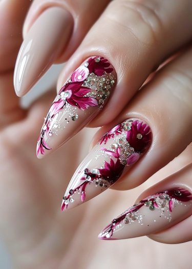 Elegant nude floral nail art with intricate designs and shimmering accents for a sophisticated look.