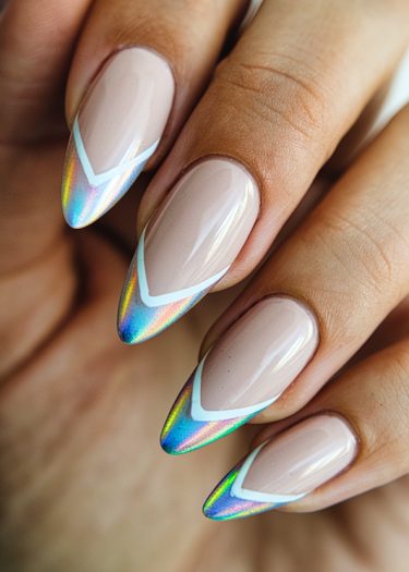 Elegant nude nails with holographic tips, showcasing modern nail art design and sophistication.