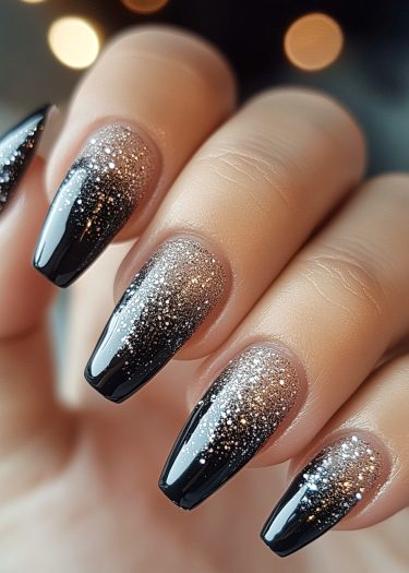 Elegant ombre glitter nails in silver and black, showcasing a sophisticated coffin style manicure.