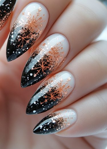 Elegant ombre nails with copper snowflakes and white speckles for a chic winter look.