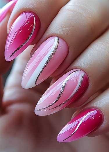 Elegant pink almond-shaped nails with glitter accents and a stylish half-and-half design.