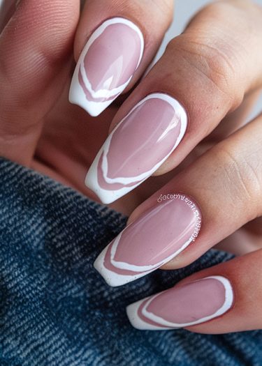 Elegant pink coffin nails with modern abstract art and glossy finish for a chic look.