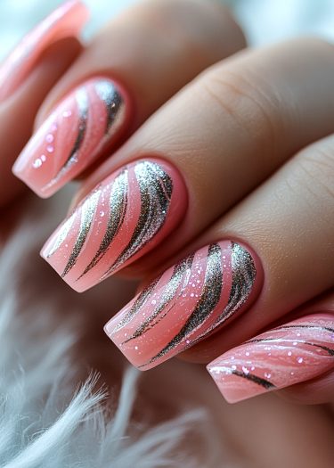 Elegant peach pink nails with sparkling silver glitter stripes and chic square tips.