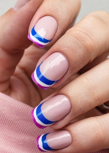 Elegant pink nail art with glossy finish and bold striped design for manicured style.