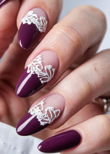 Elegant purple lace nail art with almond-shaped manicure and intricate detailing for sophisticated style.