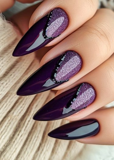 Elegant purple manicure featuring almond-shaped nails with glittery accents and intricate designs.