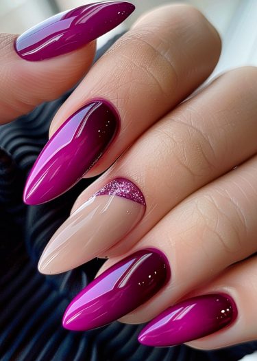 Vibrant magenta stiletto nails with glitter and elegant ombre design for stunning nail art.