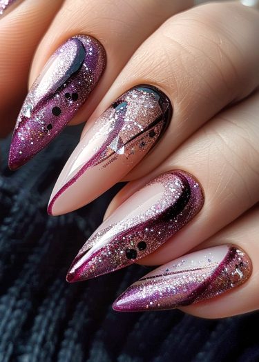 Elegant stiletto nails in ombre purple and pink with intricate designs and glitter accents.