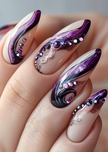 Elegant purple stiletto nails with intricate designs and gemstone embellishments for a stunning look.