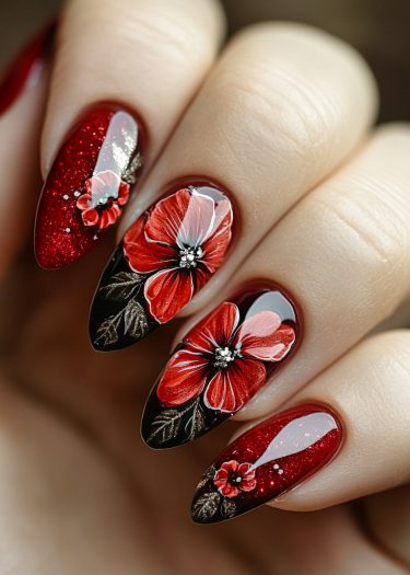 Elegant red floral nail art with intricate glittery designs and three-dimensional flowers.