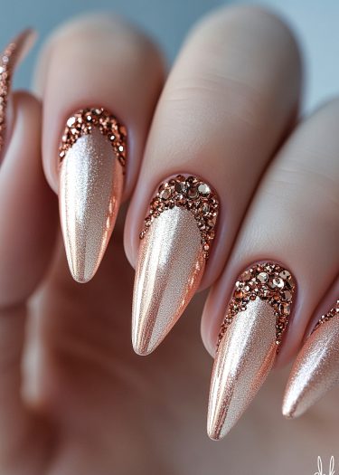 Exquisite rose gold nail art with rhinestones, showcasing elegant almond-shaped manicure for luxury style.