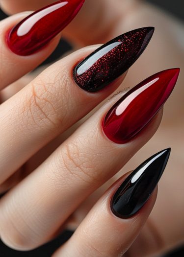 Elegant stiletto nails in glossy red and black designs showcase stunning nail art sophistication.