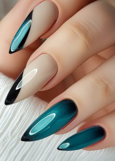 Sophisticated teal stiletto nails with geometric designs and a glossy finish.